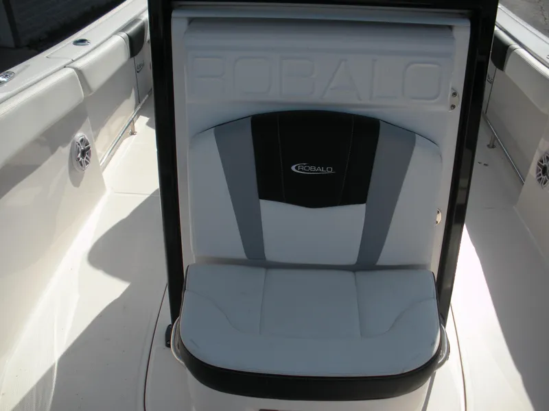 Slide: The Image of 2022 Robalo R230 Center Console boat seat and interior. - 7