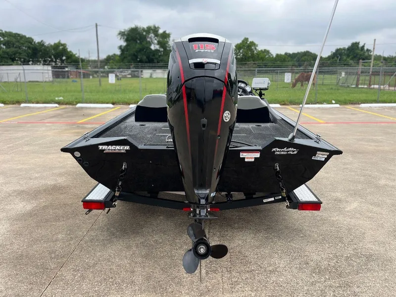 Slide: The Image of 2018 Tracker Pro Team 190 boat with outboard motor, rear view. - 11