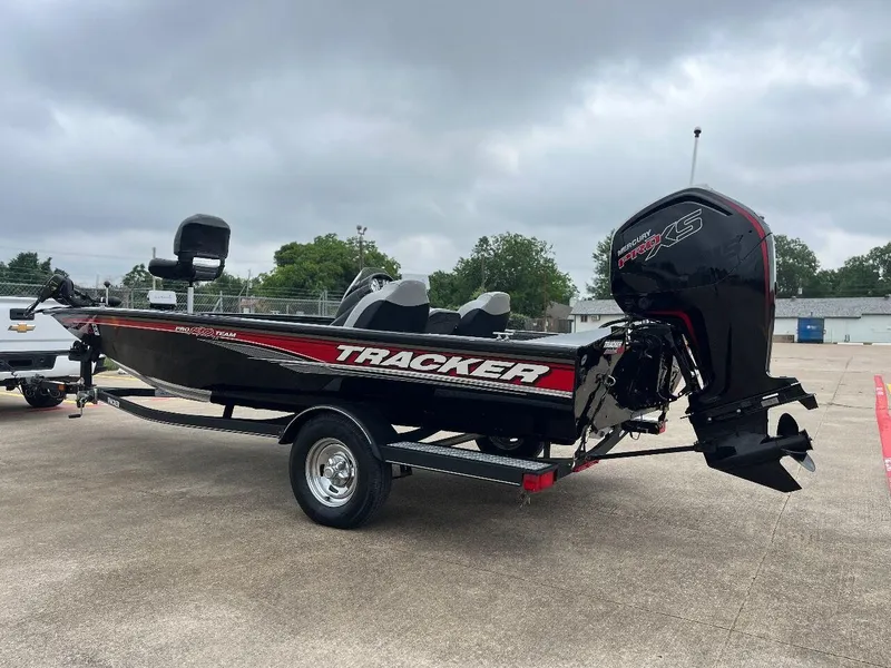 Slide: The Image of 2018 Tracker Pro Team 190 boat with outboard motor on trailer. - 2
