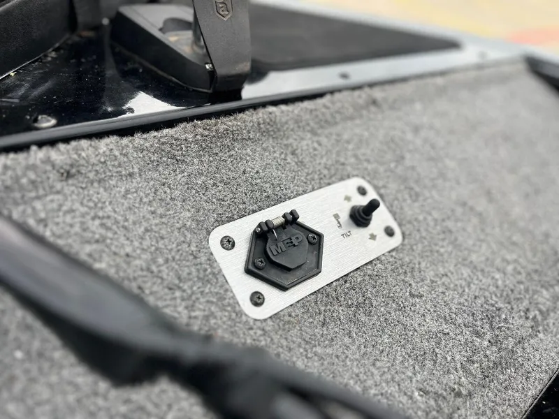 Slide: The Image of Close-up of control panel on 2018 Tracker Pro Team 190 boat. - 23