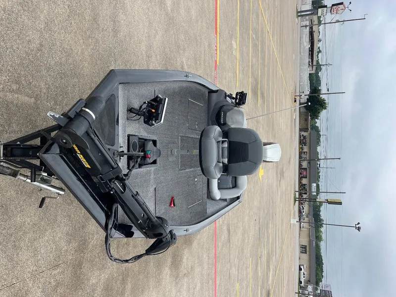 Slide: The Image of 2018 Tracker Pro Team 190 fishing boat in a parking lot. - 24