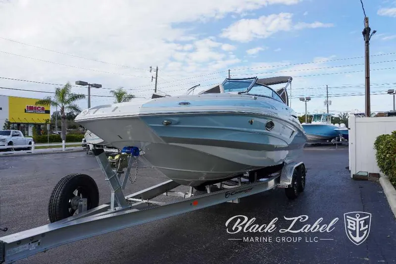 Slide: The Image of 2024 Crownline E240 XS boat on trailer at Black Label Marine Group. - 11