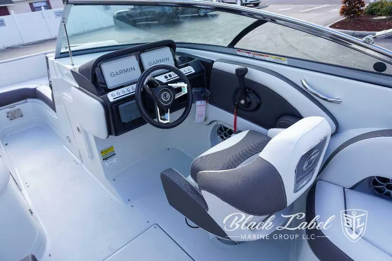Slide: The Image of 2024 Crownline E240 XS boat interior with Garmin navigation system. - 20