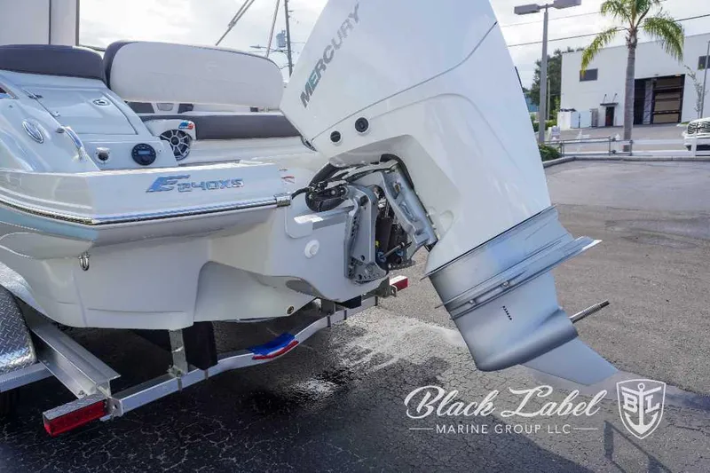Slide: The Image of 2024 Crownline E240 XS boat with Mercury outboard engine at Black Label Marine Group. - 5