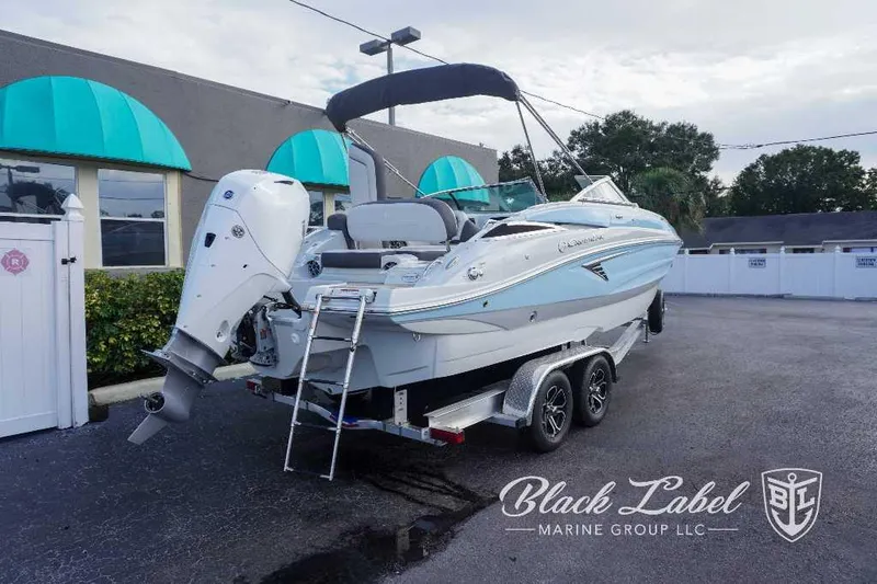 Slide: The Image of 2024 Crownline E240 XS boat on trailer at Black Label Marine Group. - 8