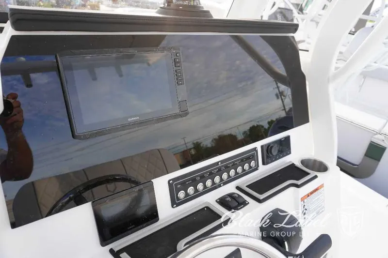 Slide: The Image of 2024 Sea Fox 251 Bay boat dashboard with Garmin navigation system. - 16