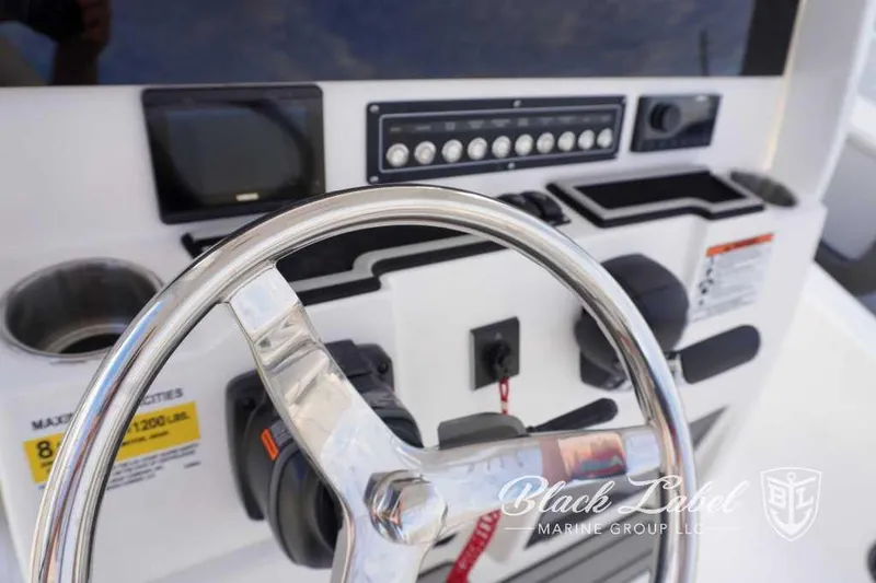 Slide: The Image of Close-up of the 2024 Sea Fox 251 Bay boat's steering console. - 20
