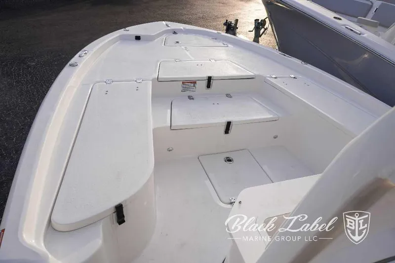 Slide: The Image of 2024 Sea Fox 251 Bay boat deck with storage compartments. - 21