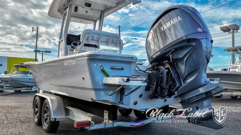 Slide: The Image of 2024 Sea Fox Seafox 251 Bay boat with Yamaha engine on trailer. - 11