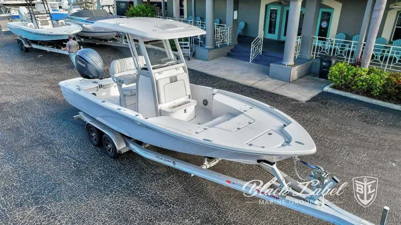 Slide: The Image of 2024 Sea Fox Seafox 251 Bay boat on a trailer at Black Label Marine Group. - 2
