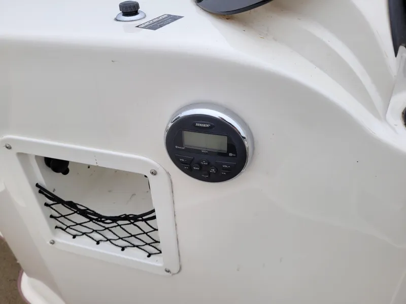 Slide: The Image of Close-up of the dashboard on a 2017 Bayliner Element E21 boat. - 13