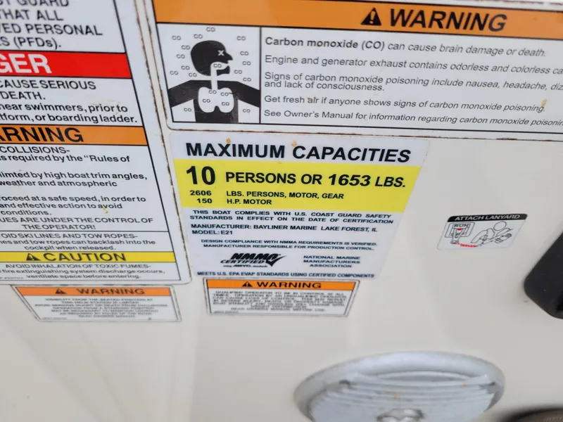 Slide: The Image of 2017 Bayliner Element E21 capacity label showing maximum of 10 persons or 1653 lbs. - 15