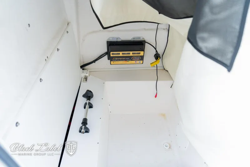 Slide: The Image of 2024 Sea Fox Seafox 251 Bay boat interior with battery compartment. - 15