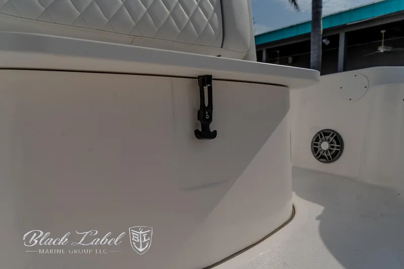 Slide: The Image of 2024 Sea Fox Seafox 251 Bay boat interior with seating and speaker detail. - 15