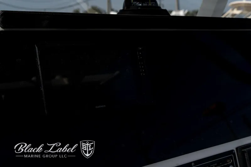 Slide: The Image of 2024 Sea Fox Seafox 251 Bay dashboard, Black Label Marine Group logo visible. - 26