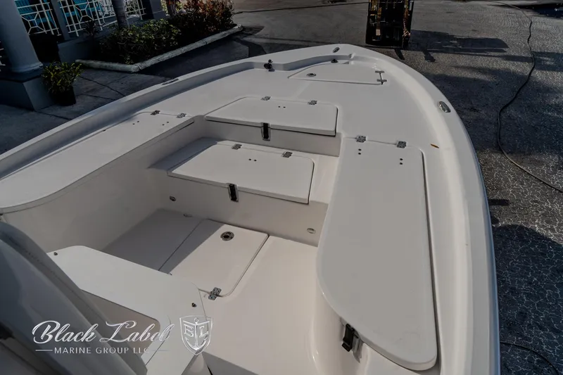 Slide: The Image of 2024 Sea Fox Seafox 251 Bay boat deck with storage compartments. - 7