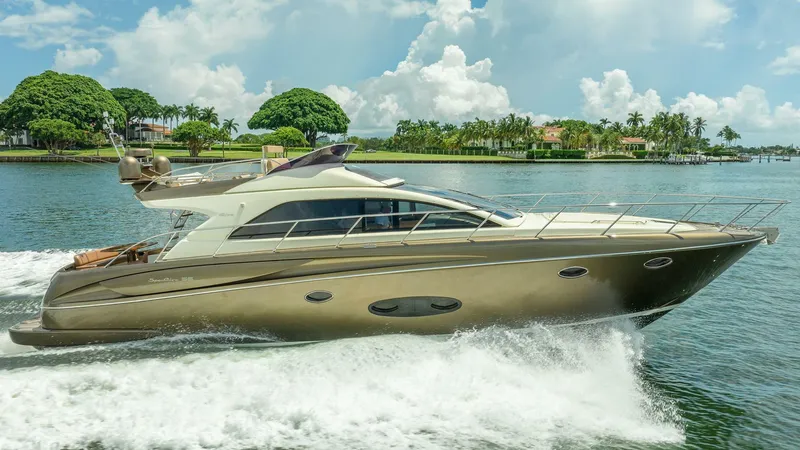 Slide: The Image of 2012 Riva 56 Sportriva yacht cruising on a sunny day. - 1