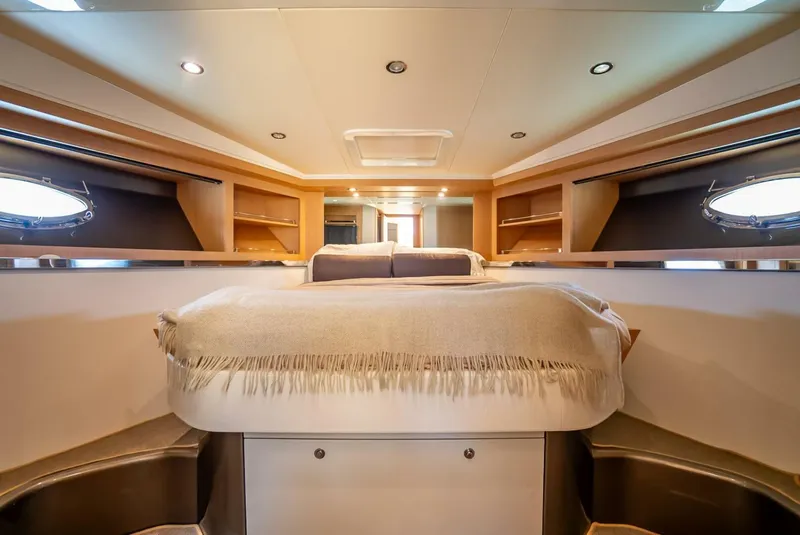 Slide: The Image of Luxurious interior of 2012 Riva 56 Sportriva yacht bedroom with elegant design. - 11