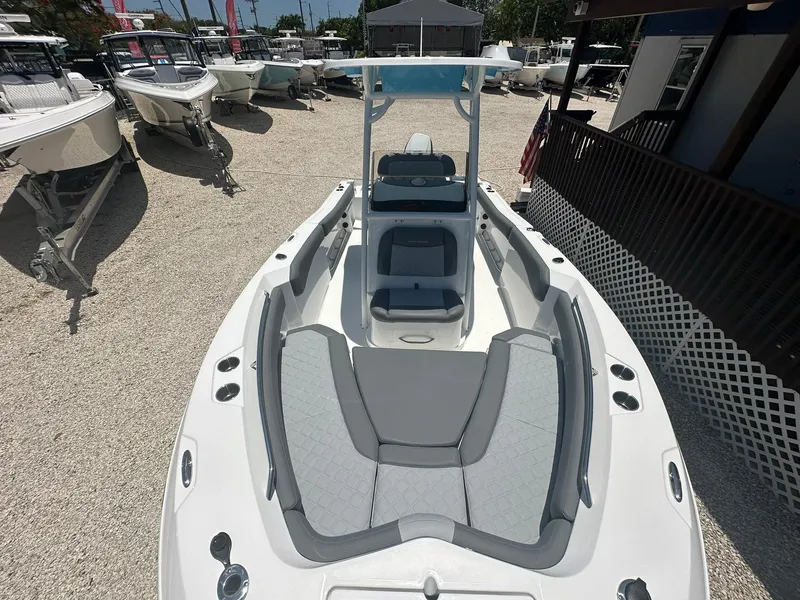 Slide: The Image of 2024 NauticStar 222 OS boat with spacious seating and modern design. - 5