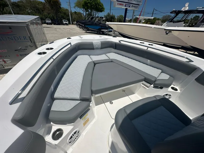 Slide: The Image of 2024 NauticStar 222 OS boat with spacious seating and modern design. - 8