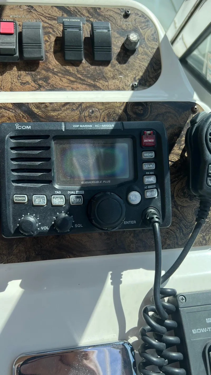 Slide: The Image of ICOM VHF Marine IC-M504 radio on 1997 Sea Ray 400 boat dashboard. - 12
