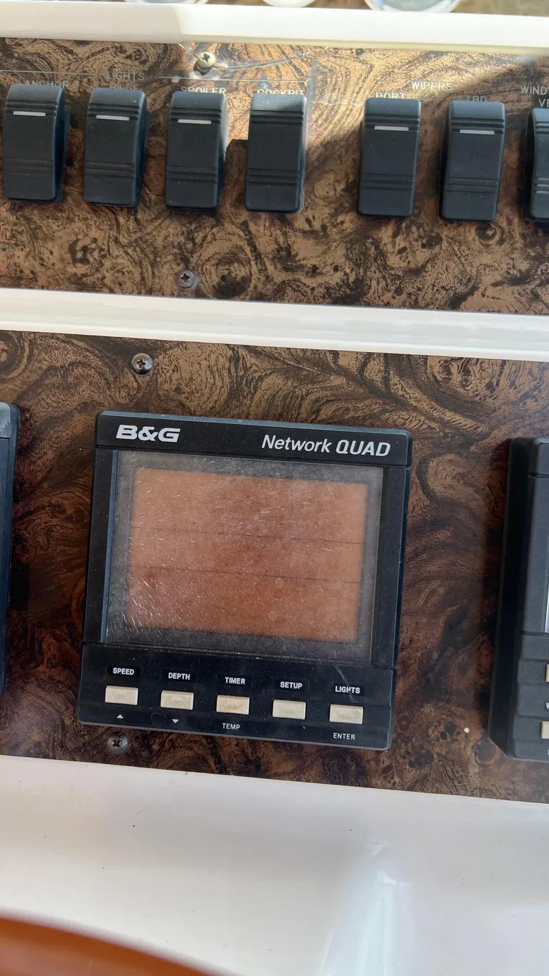 Slide: The Image of Control panel of a 1997 Sea Ray 400 boat with B&G Network QUAD display. - 14