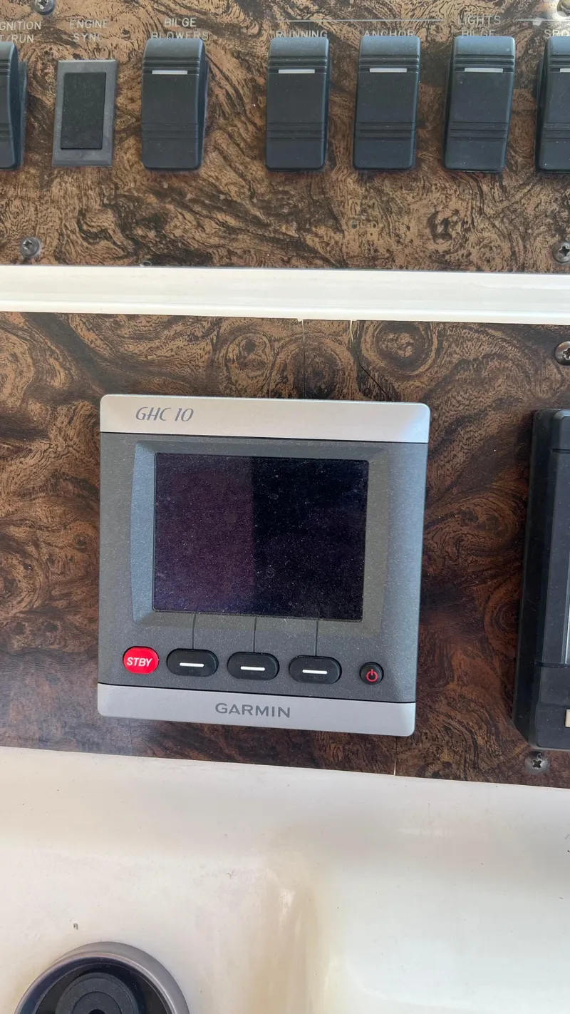 Slide: The Image of Garmin GHC 10 display on 1997 Sea Ray 400 boat control panel. - 15