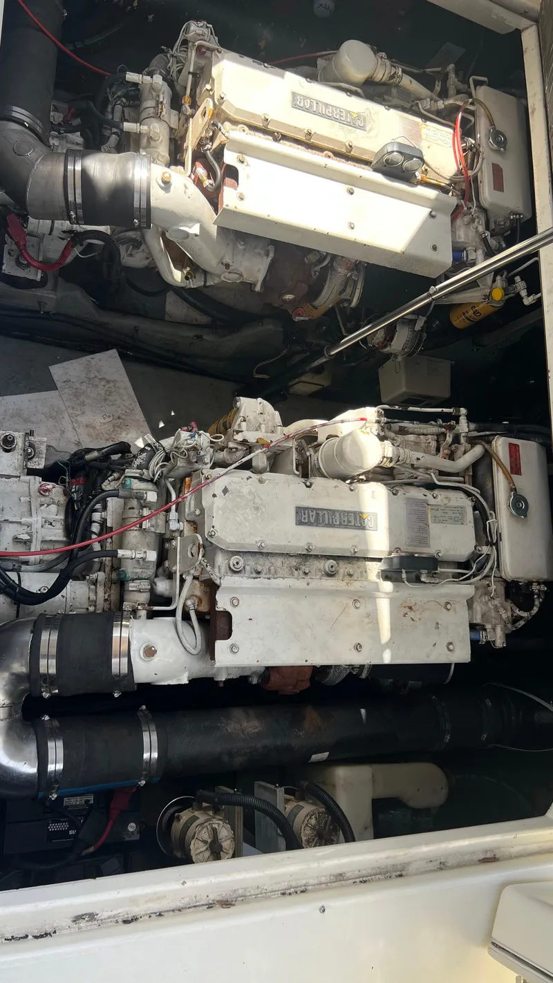 Slide: The Image of Engine compartment of a 1997 Sea Ray 400 boat with Caterpillar engines. - 22
