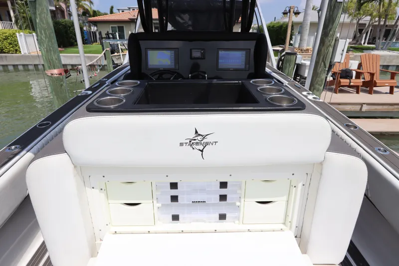 Slide: The Image of 2019 Statement 350 Open boat console with storage drawers and electronic displays. - 12