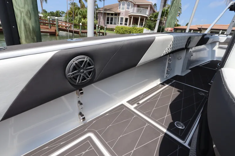 Slide: The Image of Interior view of 2019 Statement 350 Open boat with stylish seating and speaker. - 13