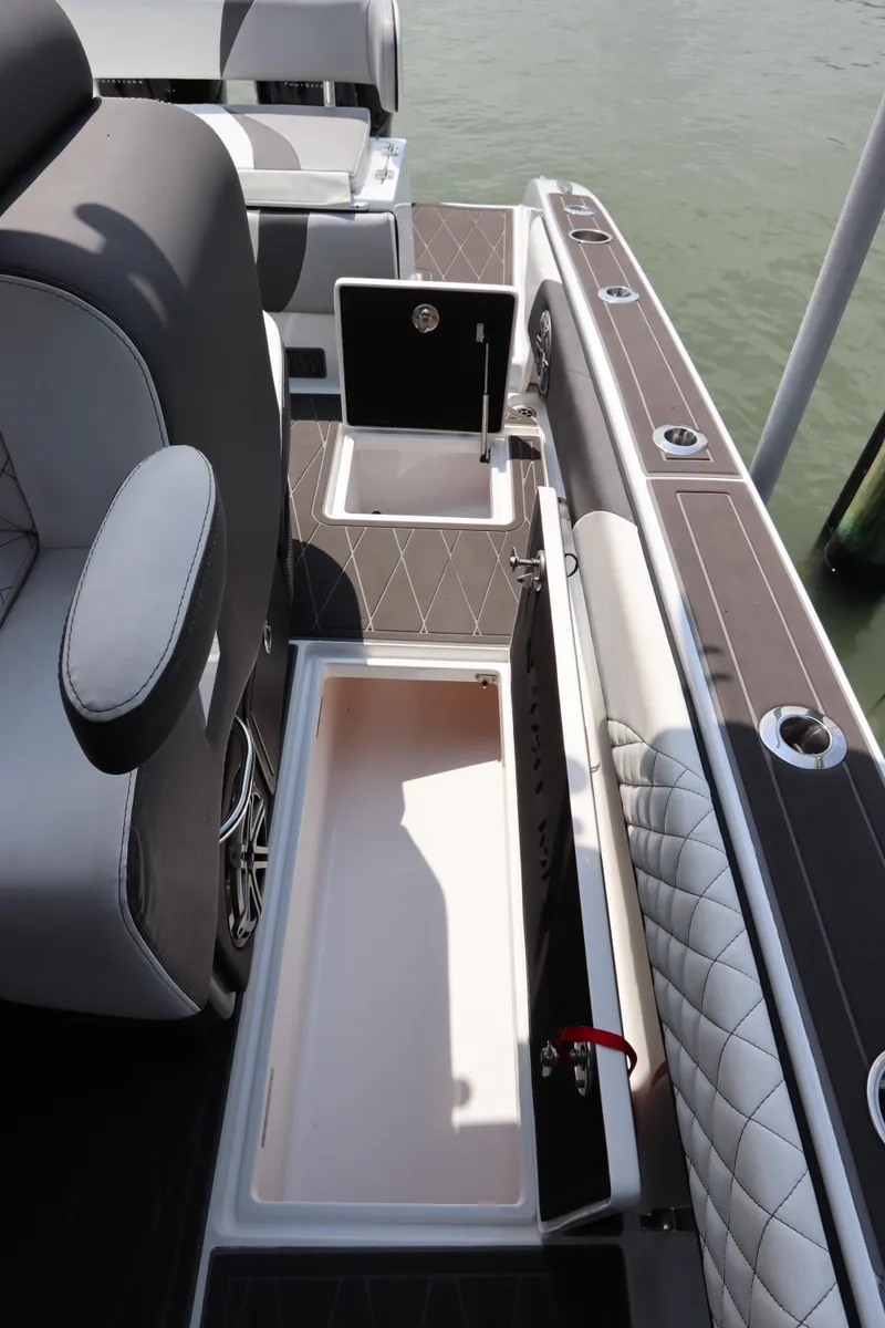 Slide: The Image of 2019 Statement 350 Open boat with open storage compartments on deck. - 16
