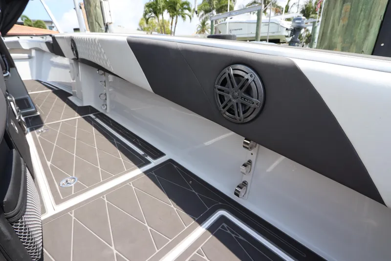 Slide: The Image of 2019 Statement 350 Open boat interior with stylish flooring and speaker system. - 17