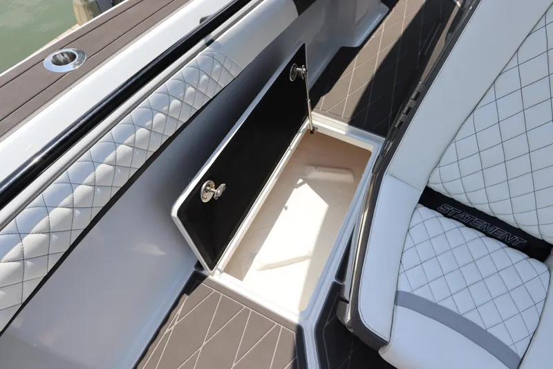 Slide: The Image of Open storage compartment on a 2019 Statement 350 Open boat. - 19