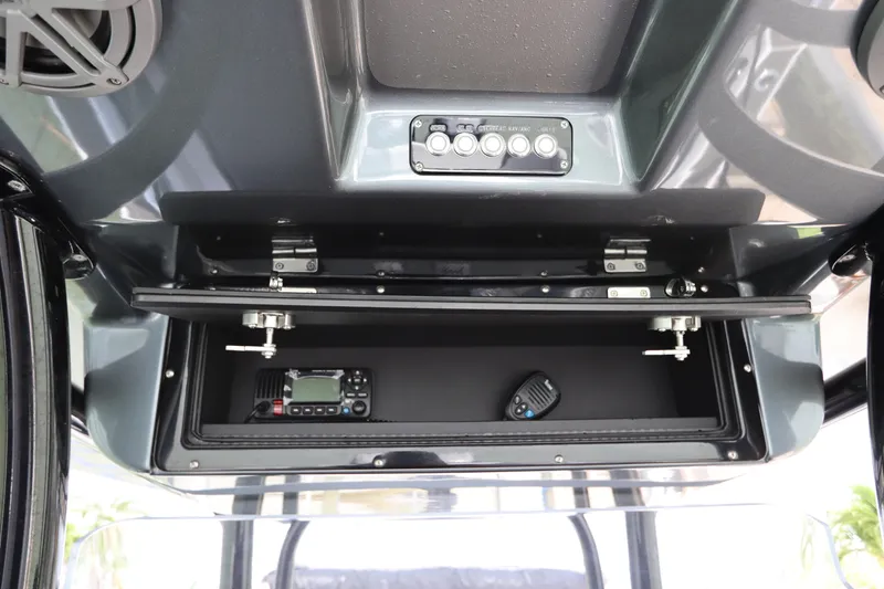 Slide: The Image of 2019 Statement 350 Open boat console with radio and control panel. - 28