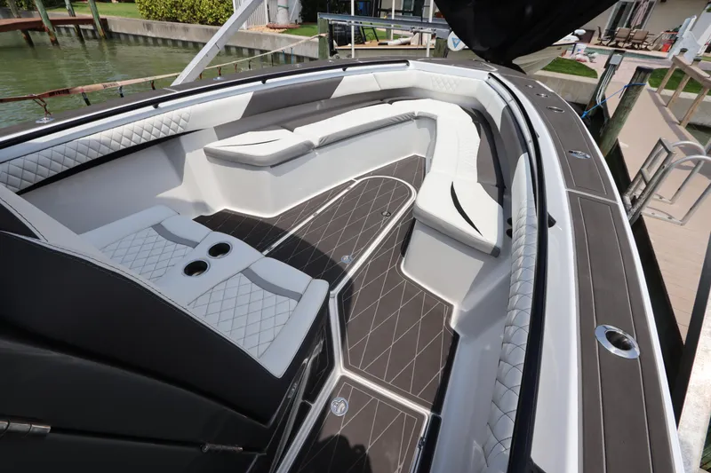 Slide: The Image of Luxurious interior of a 2019 Statement 350 Open boat with cushioned seating and sleek design. - 29