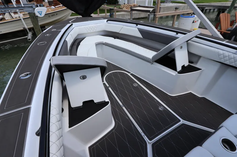 Slide: The Image of 2019 Statement 350 Open boat interior with seating and storage compartments. - 30