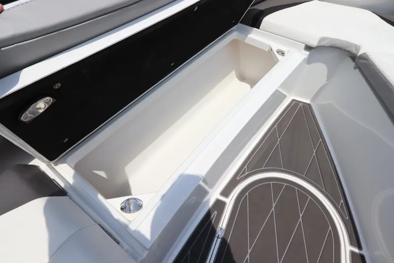 Slide: The Image of 2019 Statement 350 Open boat storage compartment with cushioned seating and non-slip flooring. - 32