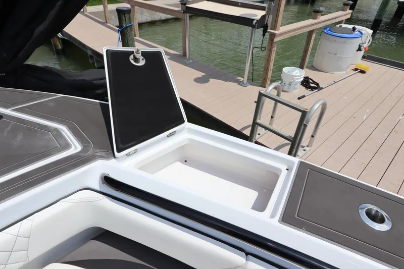 Slide: The Image of 2019 Statement 350 Open boat with open storage compartment at dock. - 35