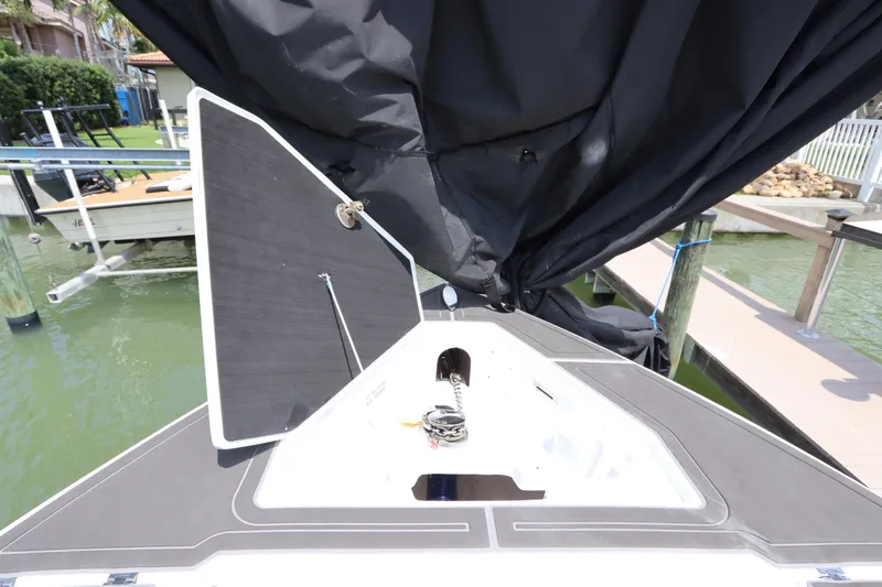 Slide: The Image of 2019 Statement 350 Open boat with open storage compartment at dock. - 36
