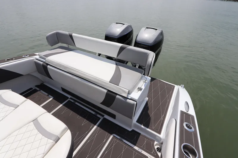Slide: The Image of 2019 Statement 350 Open boat with dual outboard motors and cushioned seating. - 5
