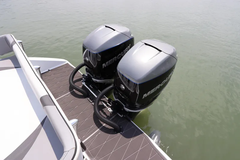 Slide: The Image of Twin Mercury outboard engines on a 2019 Statement 350 Open boat. - 6