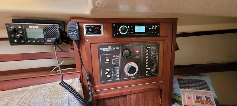 Slide: The Image of Control panel of a 1986 Island Packet 27 Sloop with navigation and communication equipment. - 20