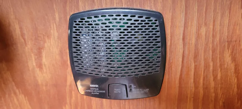 Slide: The Image of Marine speaker on 1986 Island Packet 27 Sloop, mounted on wooden panel. - 23