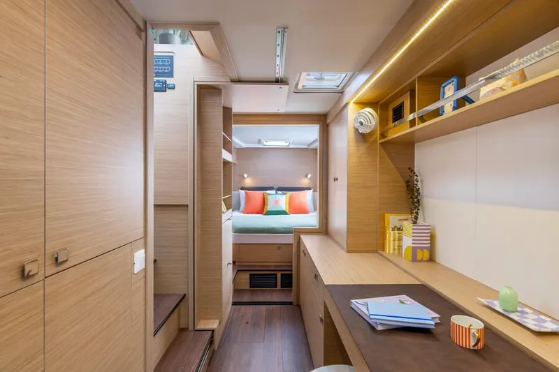 Slide: The Image of Luxurious interior of 2025 Lagoon 43 yacht with modern design and cozy bedroom. - 25
