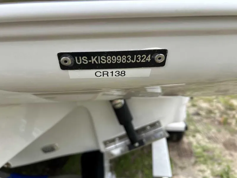 Slide: The Image of 2024 Crownline 270 XSS boat hull identification number (HIN) plate and CR138 label. - 7