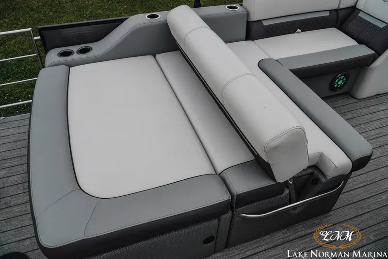 Slide: The Image of 2021 Godfrey SWEETWATER 2286 SFL boat seating area with cup holders, Lake Norman Marina. - 11