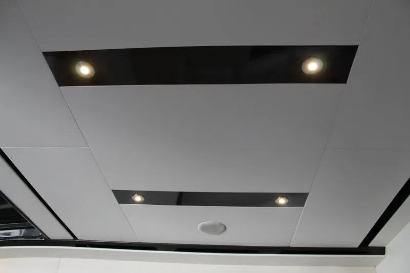 Slide: The Image of Ceiling lights in 2016 Sea Ray 400 Sundancer yacht interior. - 22
