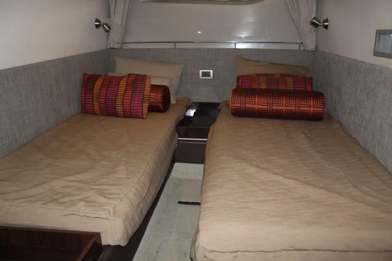 Slide: The Image of 2016 Sea Ray 400 Sundancer twin beds cabin interior - 41