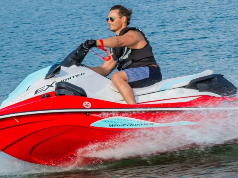 Slide: The Image of Man riding 2024 Yamaha WaveRunner EX® Limited on water. - 5