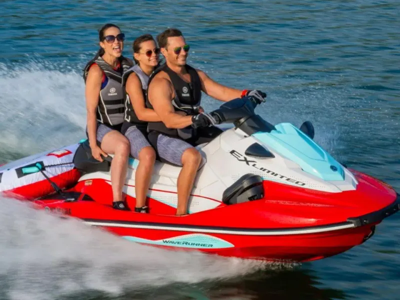 Slide: The Image of 2024 Yamaha WaveRunner EX® Limited with three riders enjoying a water adventure. - 6